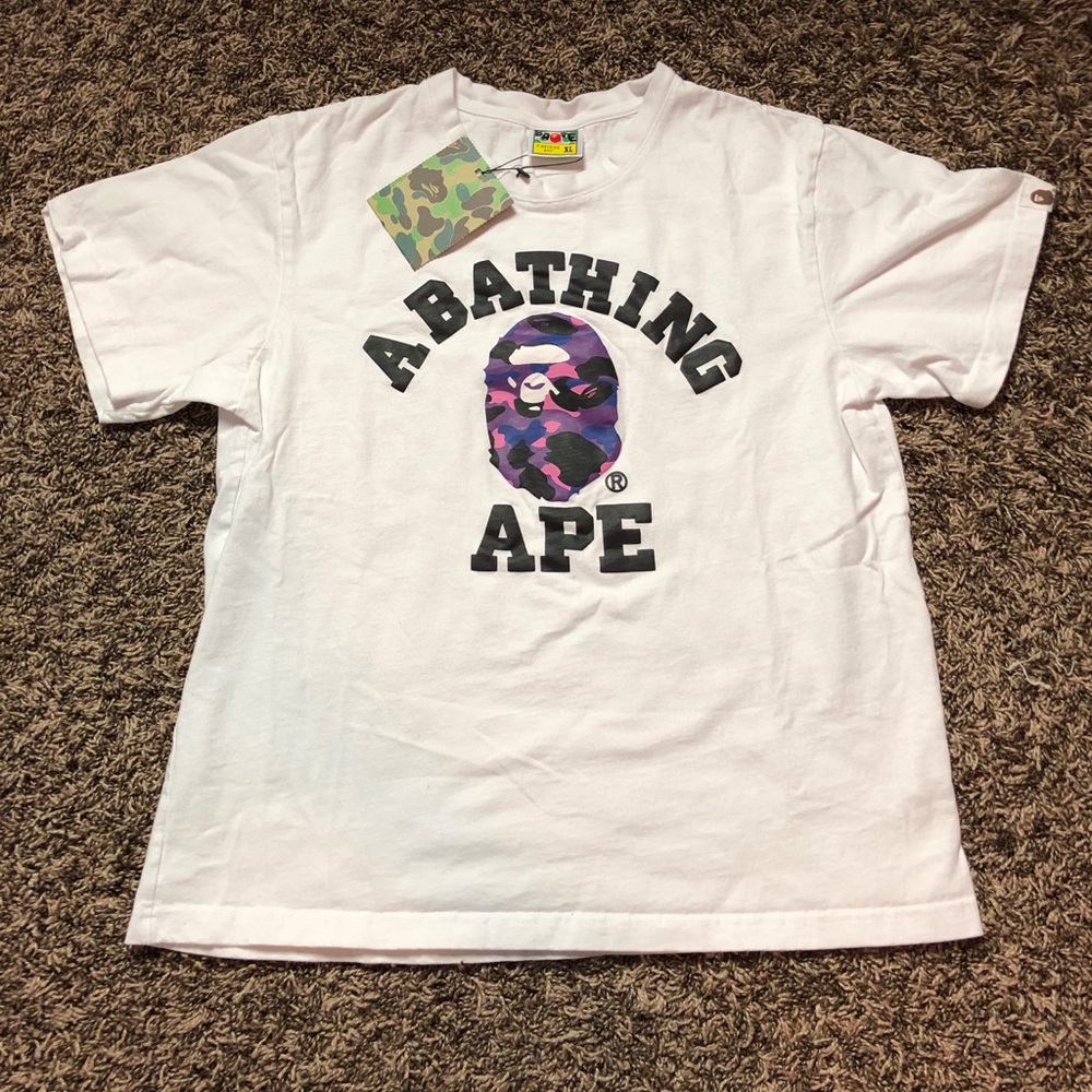A BATHING APE: PURPLE CAMO COLLEGE TEE (SIZE XL)